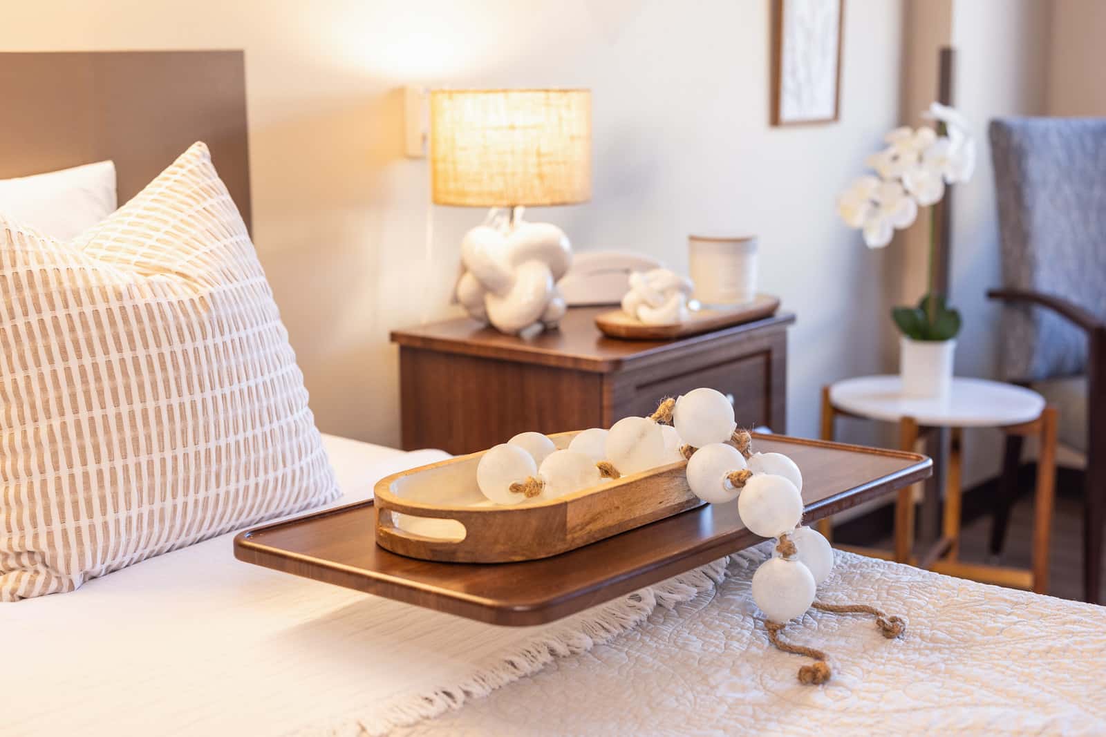 view of the bed and nightstand in a bedroom in Hilltop Park
